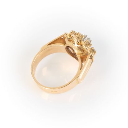 Gold and platinum ring centered on a diamond...