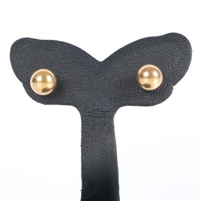 Pair of gold (750‰) stud earrings. Diam....