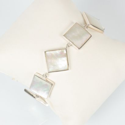 Silver bracelet decorated with squares set...