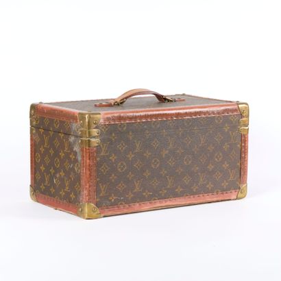 LOUIS VUITTON. Vanity case in Monogram coated...