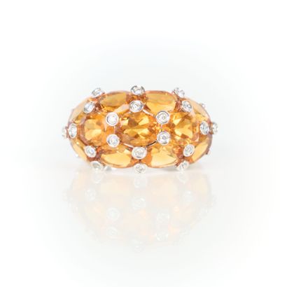 White gold (750‰) band ring paved with citrines...