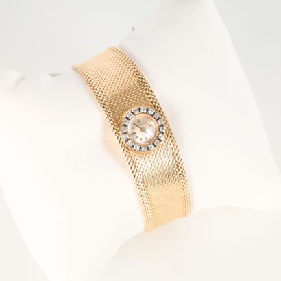 OMEGA. Gold ladies' wristwatch, diamond-set...