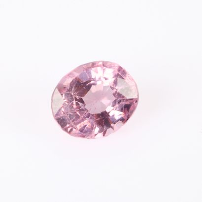 Oval pink spinel on paper with certificate:...