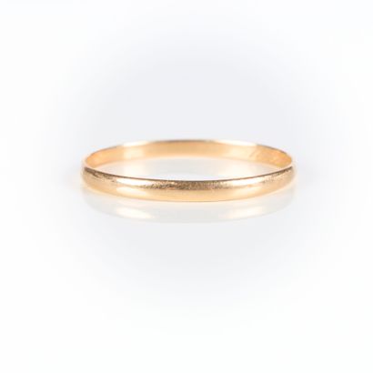 Gold wedding band. 1.13 g. 18 K
