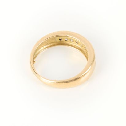 Gold wedding band set with a line of 9 diamonds....