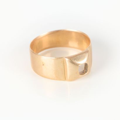 Gold ring with square motif. Stone missing....