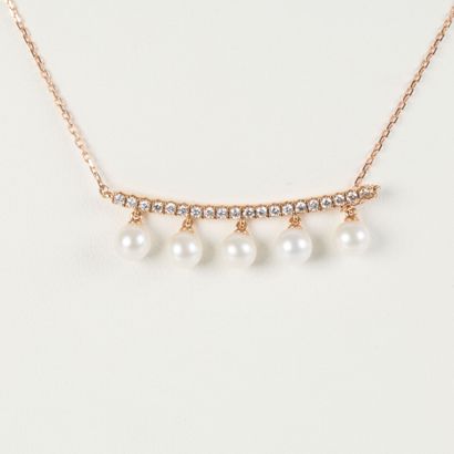 Pink gold necklace (750‰), adorned with a...