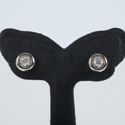 Pair of ear studs in white gold, each set...