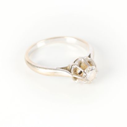 White gold solitaire ring set with a modern...