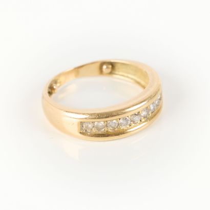 Gold wedding band set with a line of 9 diamonds....