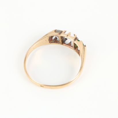 Gold ring set with an old-cut diamond weighing...