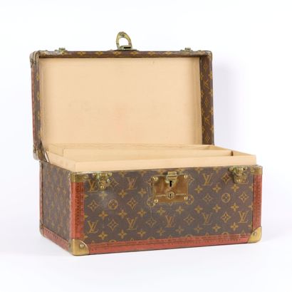 LOUIS VUITTON. Vanity case in Monogram coated...