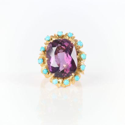 Rose gold ring set with a large amethyst...