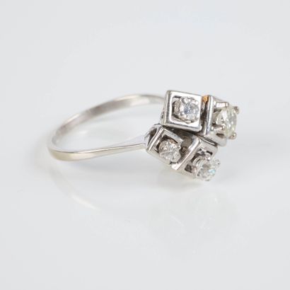 White gold ring (750‰) adorned with four...