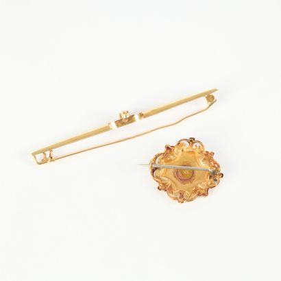 2 gold brooches set with small stones: rosette...