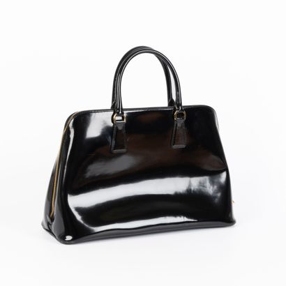 PRADA. Black patent leather handbag. 36 x...