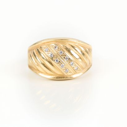 Gold ring set with 2 lines of small diamonds....