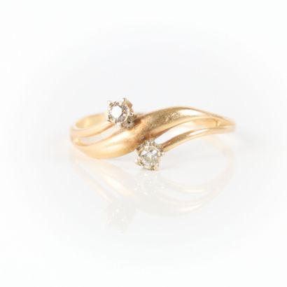 toi et moi ring in gold set with two small...