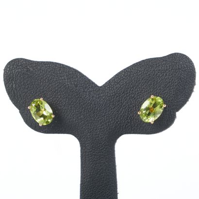 Pair of yellow gold (750‰) ear studs, each...