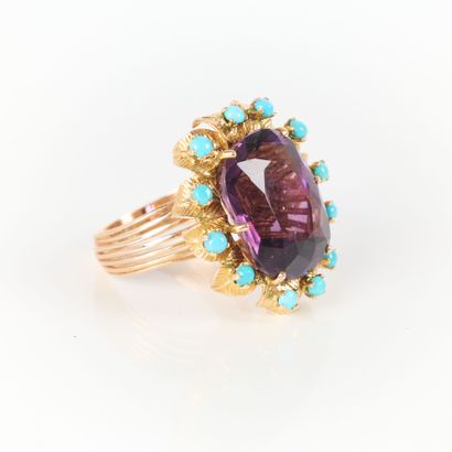 Rose gold ring set with a large amethyst...