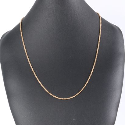 Twisted gold long necklace. 70 cm. 20.95...