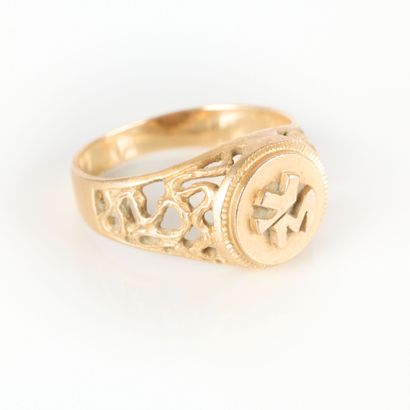 Openwork gold signet ring numbered YM. TDD...