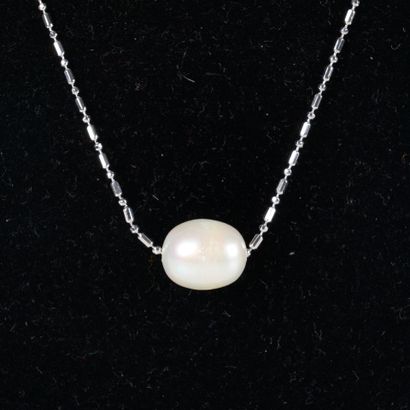Necklace adorned with a cultured pearl on...