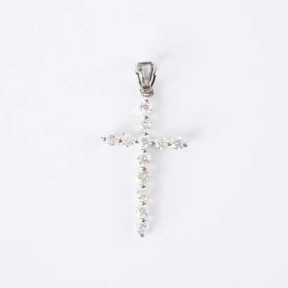 Cross pendant in white gold set with 12 round...