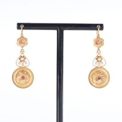 Pair of openwork and engraved gold earrings...