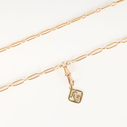 Large gold long necklace with charm. 180...