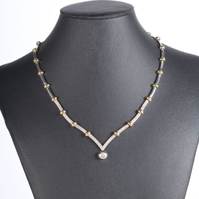 Articulated necklace in two-tone gold, with...
