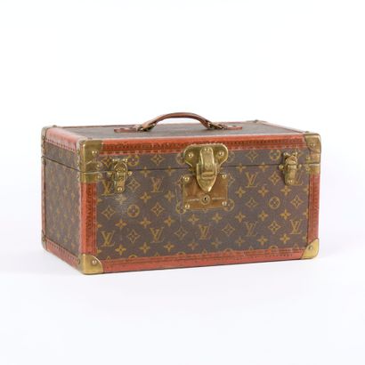 LOUIS VUITTON. Vanity case in Monogram coated...