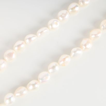 Baroque-shaped long necklace of natural cultured...