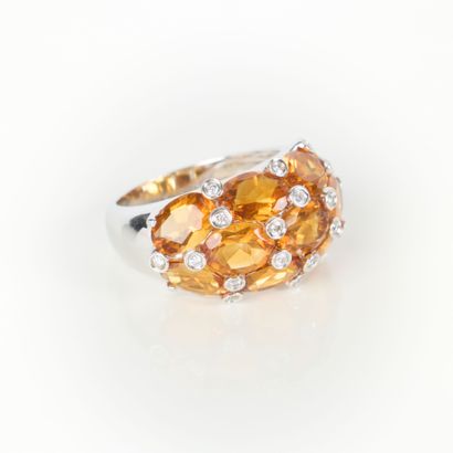 White gold (750‰) band ring paved with citrines...