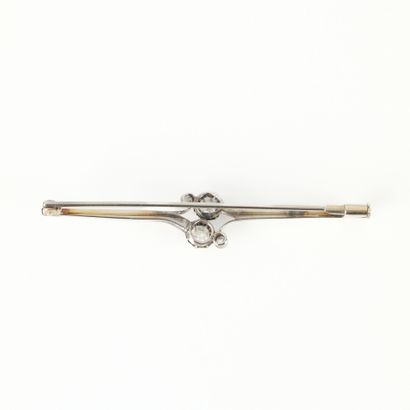 White gold barrette brooch set with four...