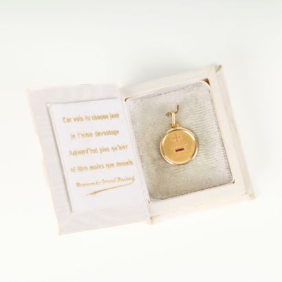 Gold love medal set with a diamond and small...