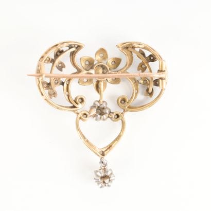 Two-tone gold pendant brooch set with floral...
