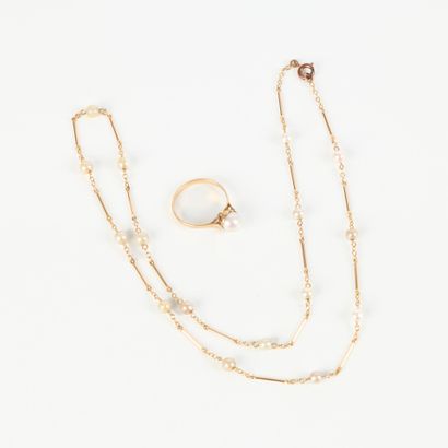 Gold ring set with a cultured pearl (TDD...