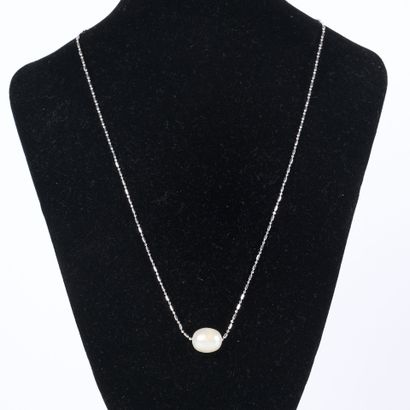 Necklace adorned with a cultured pearl on...