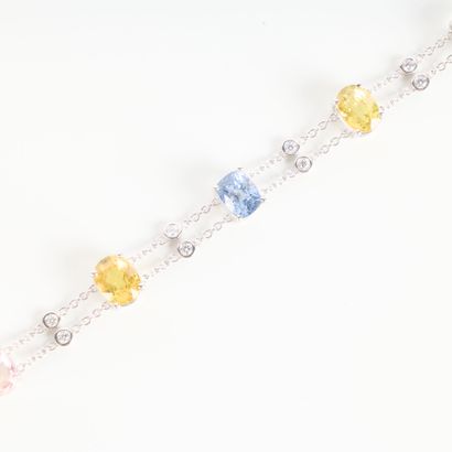 White gold bracelet set with seven yellow,...