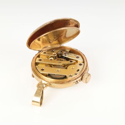 Gold collar watch with landscape design surrounded...