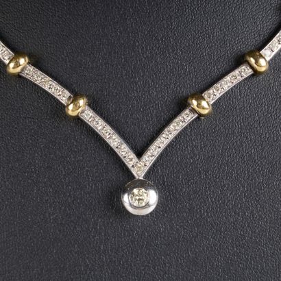 Articulated necklace in two-tone gold, with...