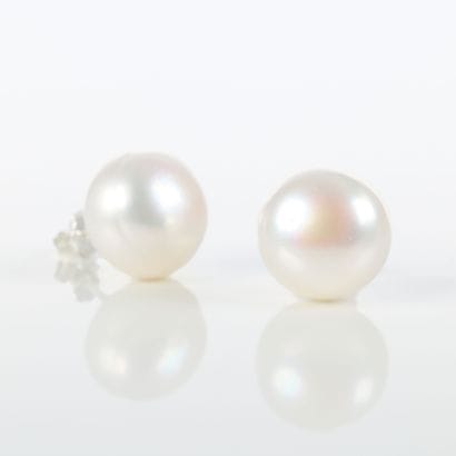 Pair of silver ear studs, each set with a...