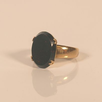 Rose gold ring set with an oval blood jasper...