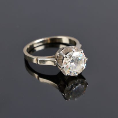White gold solitaire ring set with a white...