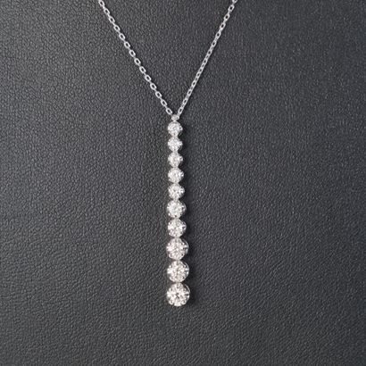 White gold (750‰) articulated pendant, set...