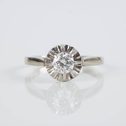White gold (750‰) and platinum solitaire...