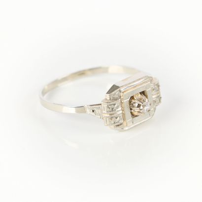 White gold ring set with a small white stone....