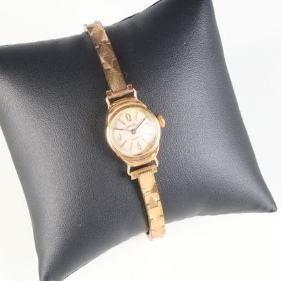 Gold ladies' watch, round dial, flexible...