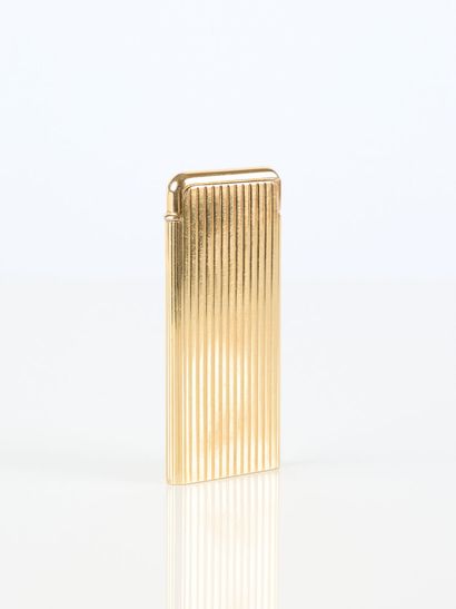 REPOSSI. Gold and engraved metal lighter....